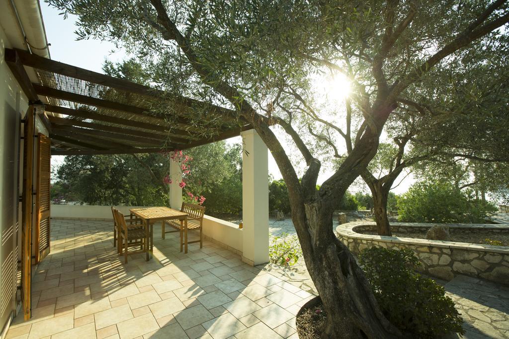Nereidi Pool Villas Porto Ozias Bagian luar foto