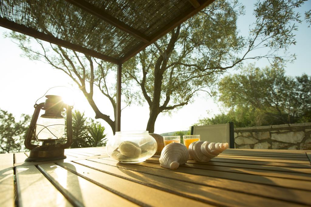 Nereidi Pool Villas Porto Ozias Bagian luar foto