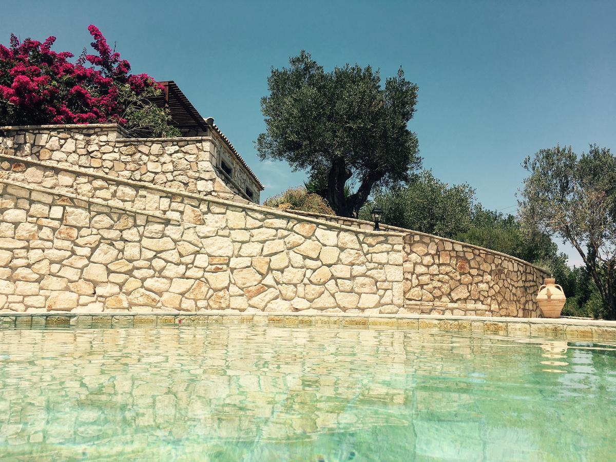 Nereidi Pool Villas Porto Ozias Bagian luar foto