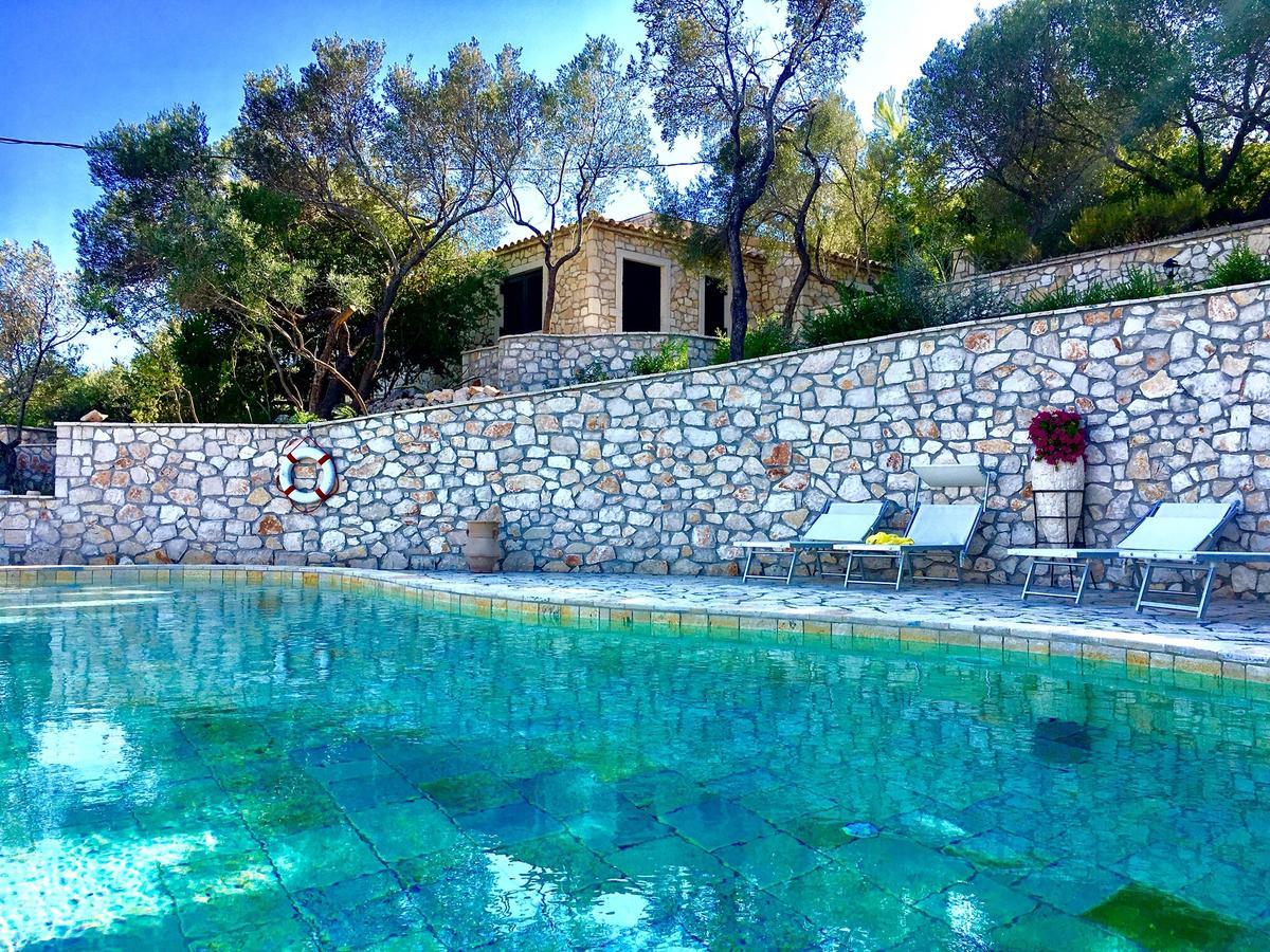 Nereidi Pool Villas Porto Ozias Bagian luar foto