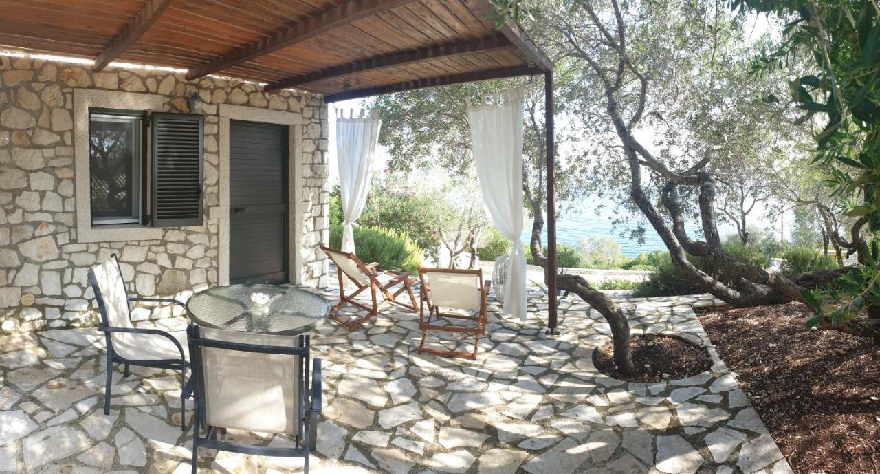 Nereidi Pool Villas Porto Ozias Bagian luar foto